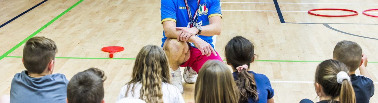 A group of children with an Active Schools coach