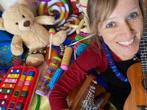 Kirsty Whatley and Emma Bear practicing to deliver Happy Little Tunes